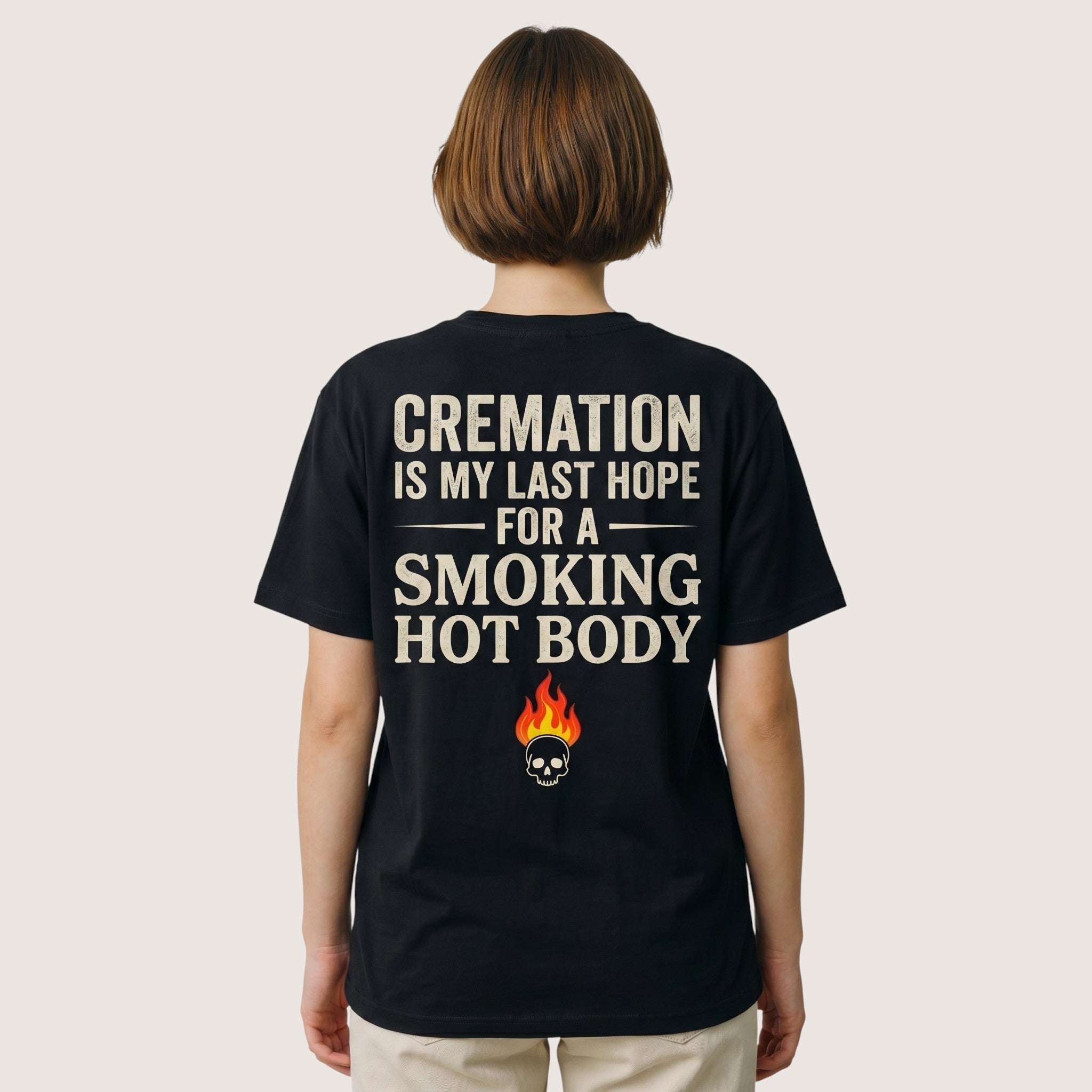 TrendyShift.Com black unisex cotton t-shirt with back graphic print featuring a skull, flame, and dark humor quote.